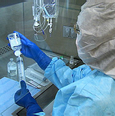 pharmacist mixing medicines